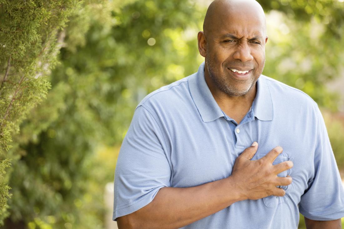 Man holds chest