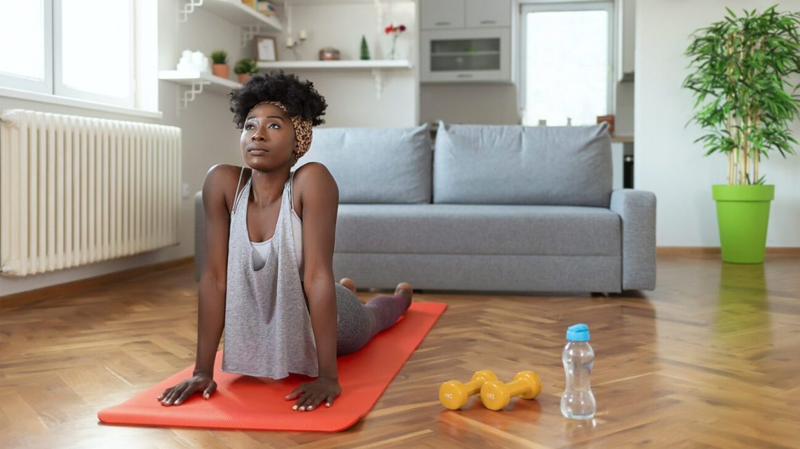 Female Living Room Yoga 1296x728 header