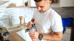 Man Preparing Supplement Shake