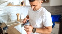 Man Preparing Supplement Shake